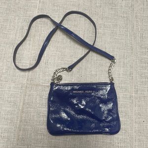 Michael Kors. Royal blue patent crossbody purse. Silver hardware. Approx 8”x5.5”